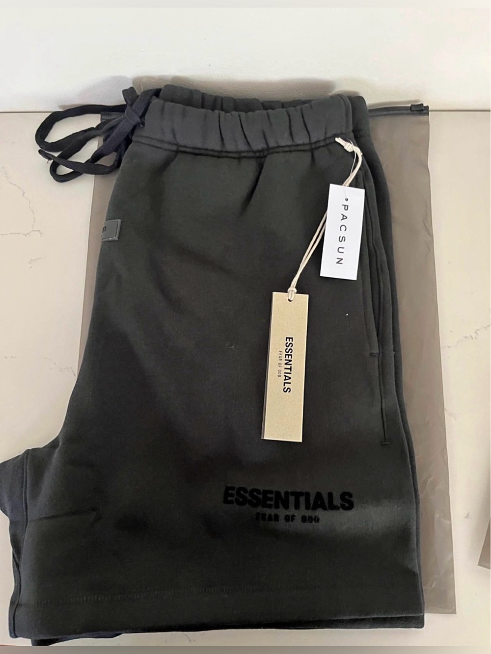 Essentials Men's Black shorts with ESSENTIALS Branding